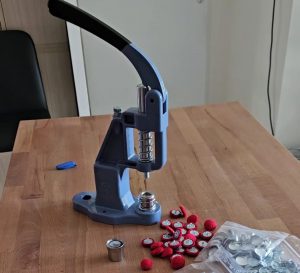 Presse à Boutons